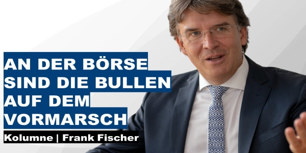Frank Fischer im Anzug mit blauer Krawatte